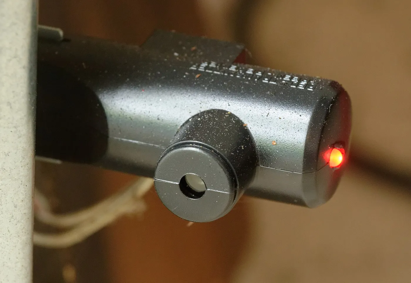 Garage door photoelectric safety sensor detail